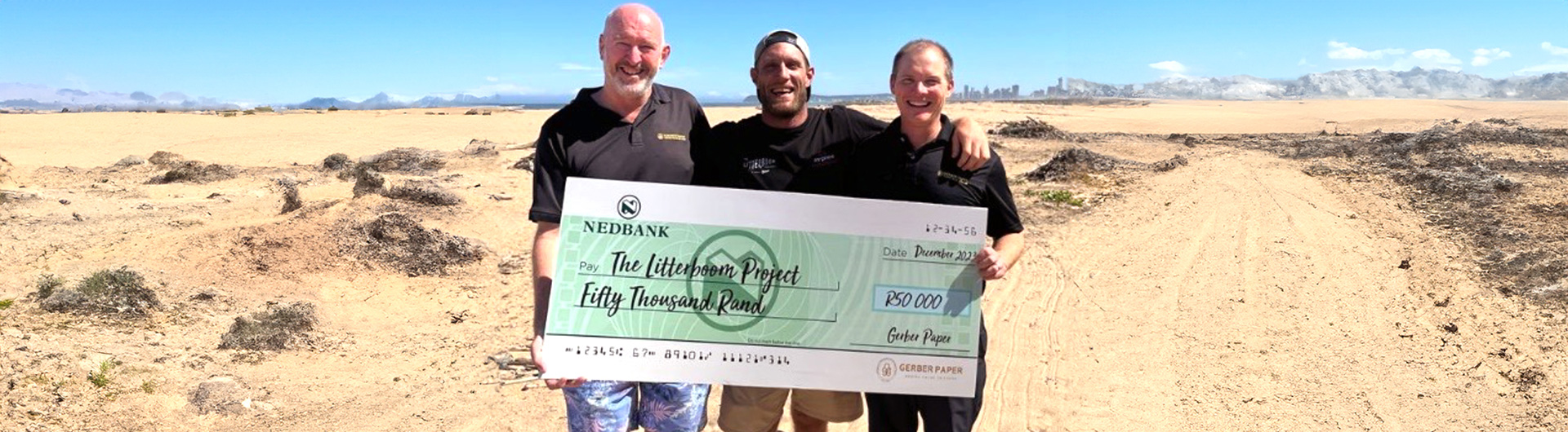 Receiving the Gerber Paper cheque is Josh Redman