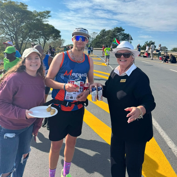 Comrades Marathon participant receiving support from the Gerber Paper team