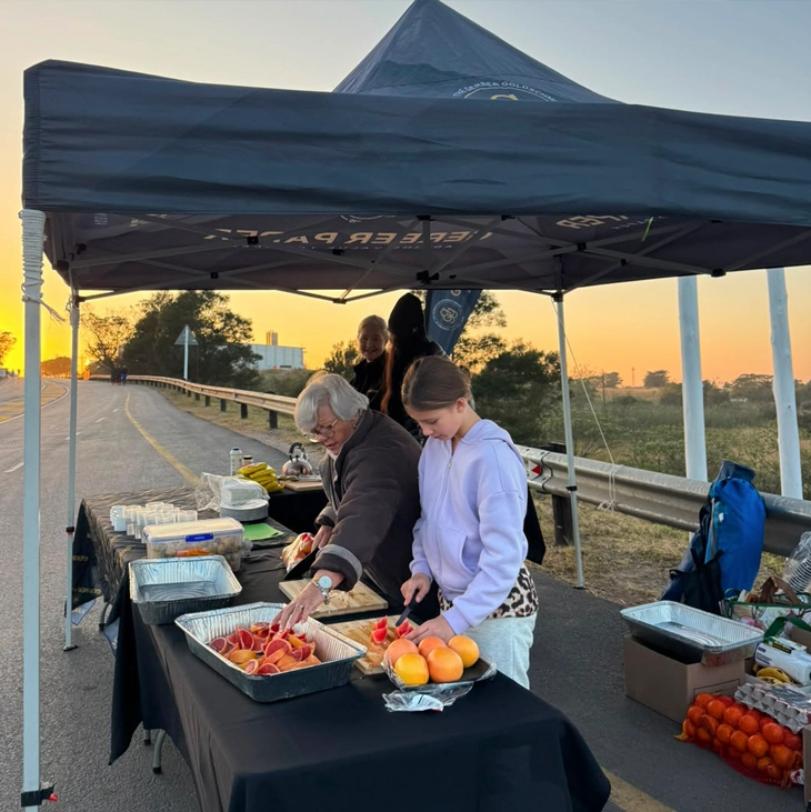 Gerber Paper support tent providing drinks and snacks along the Comrades route