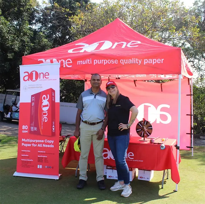Gerber Paper team welcoming players at the Durban Golf Day Aone Paper stand.
