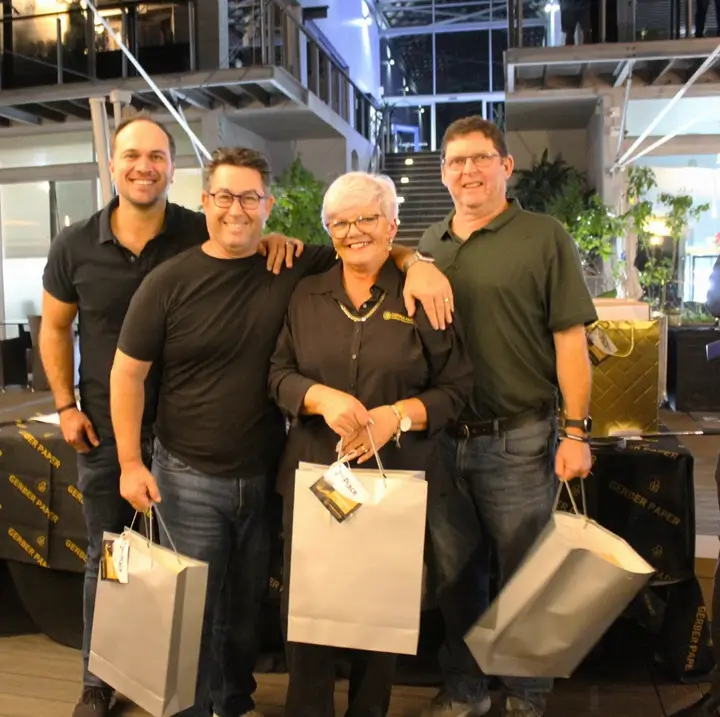 Prize winners posing with gift bags at the Durban Golf Day awards.